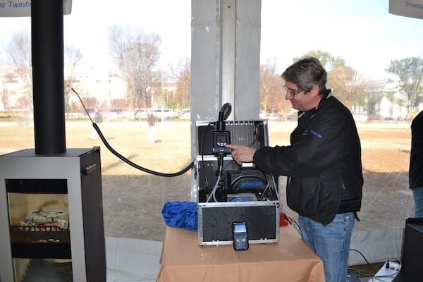 Peter Cullen demonstrates the SM 500 Suspended Particulate Analyzer.