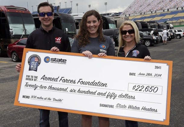 State Water Heaters presented a check to the Armed Forces Foundation at the Quaker State 400 in Kentucky on Saturday, June 28. The company recently supported Kurt Busch's "Double" attempt on May 25 by pledging $25 for every mile he completed in both the Indianapolis 500 and the Coca-Cola 600.