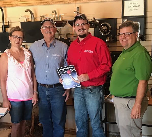 From left to right: Leasa Brosseau, owner, KCP; Kent Brosseau, owner, KCP; Leevon DeCourley, service manager, KCP; and Sean Blachford senior territory manager, Moen.