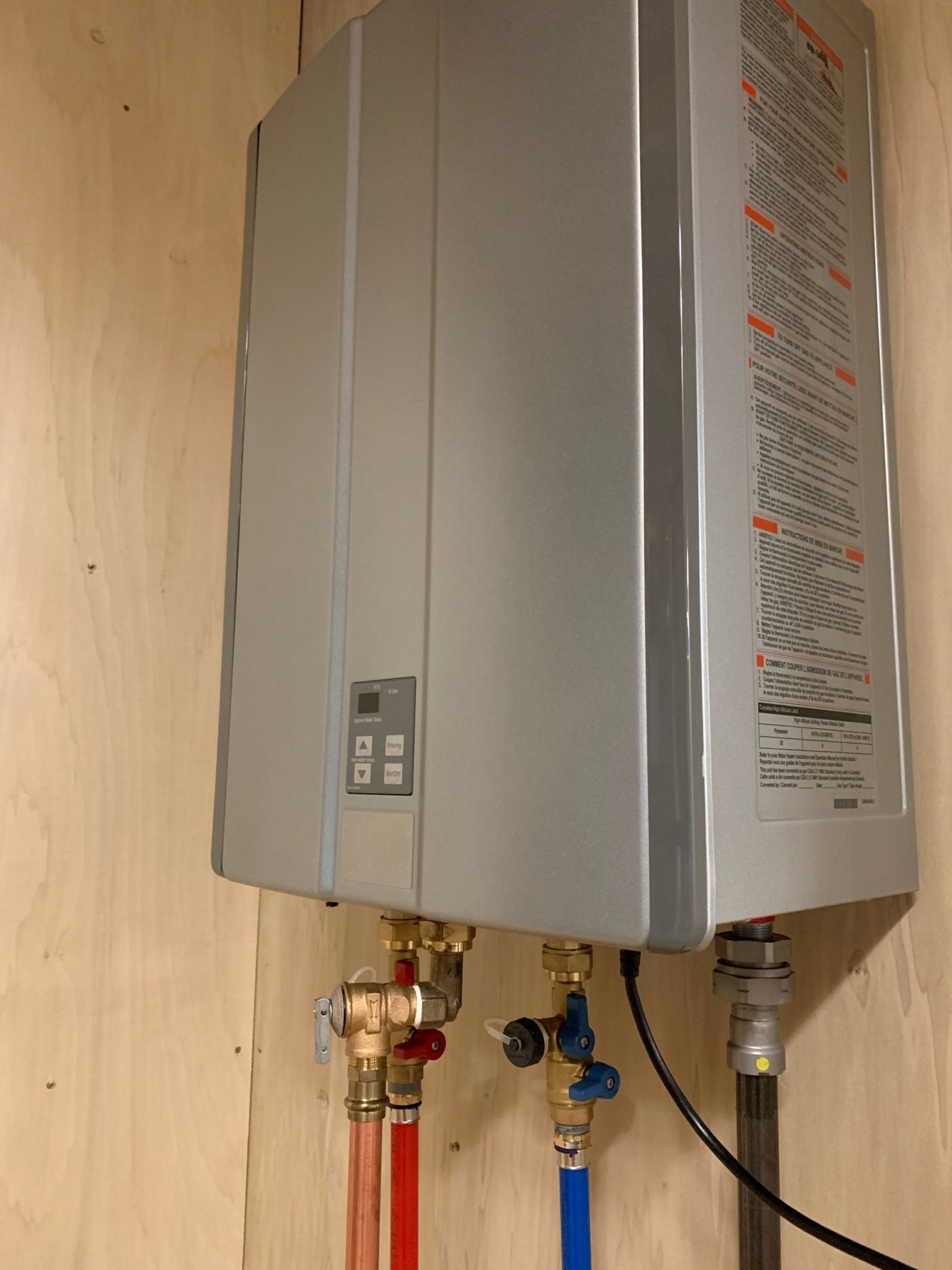 document-addresses-connecting-plastic-pipe-to-tankless-water-heaters